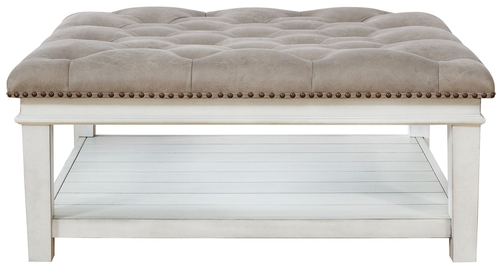 Signature Design by Ashley® Kanwyn - Whitewash - Uph Ottoman Cocktail Table | Meri Furniture