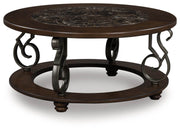 Frallyn - Round Cocktail Table - Dark Brown