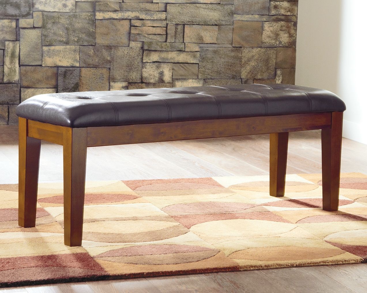 Signature Design by Ashley® Ralene - Medium Brown - Large Uph Dining Room Bench | Meri Furniture