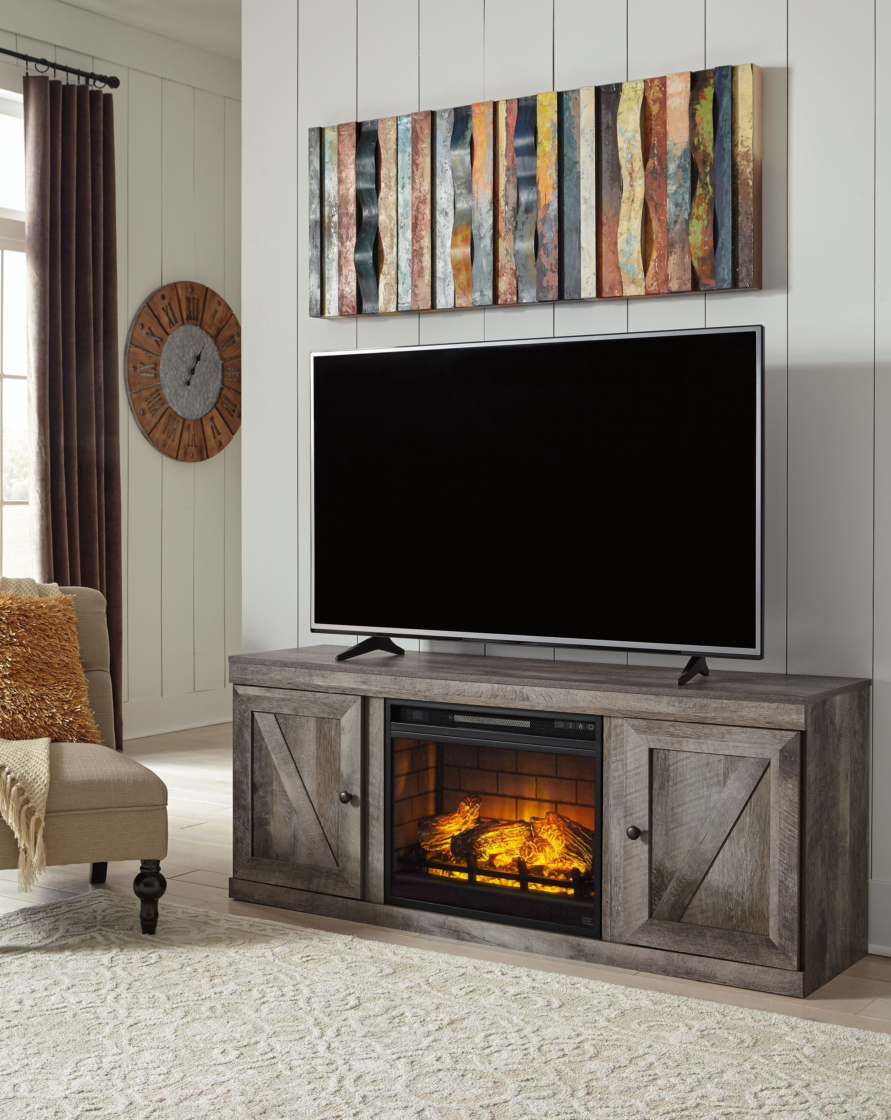 Signature Design by Ashley® Wynnlow - Gray - TV Stand With Faux Firebrick Fireplace Insert | Meri Furniture
