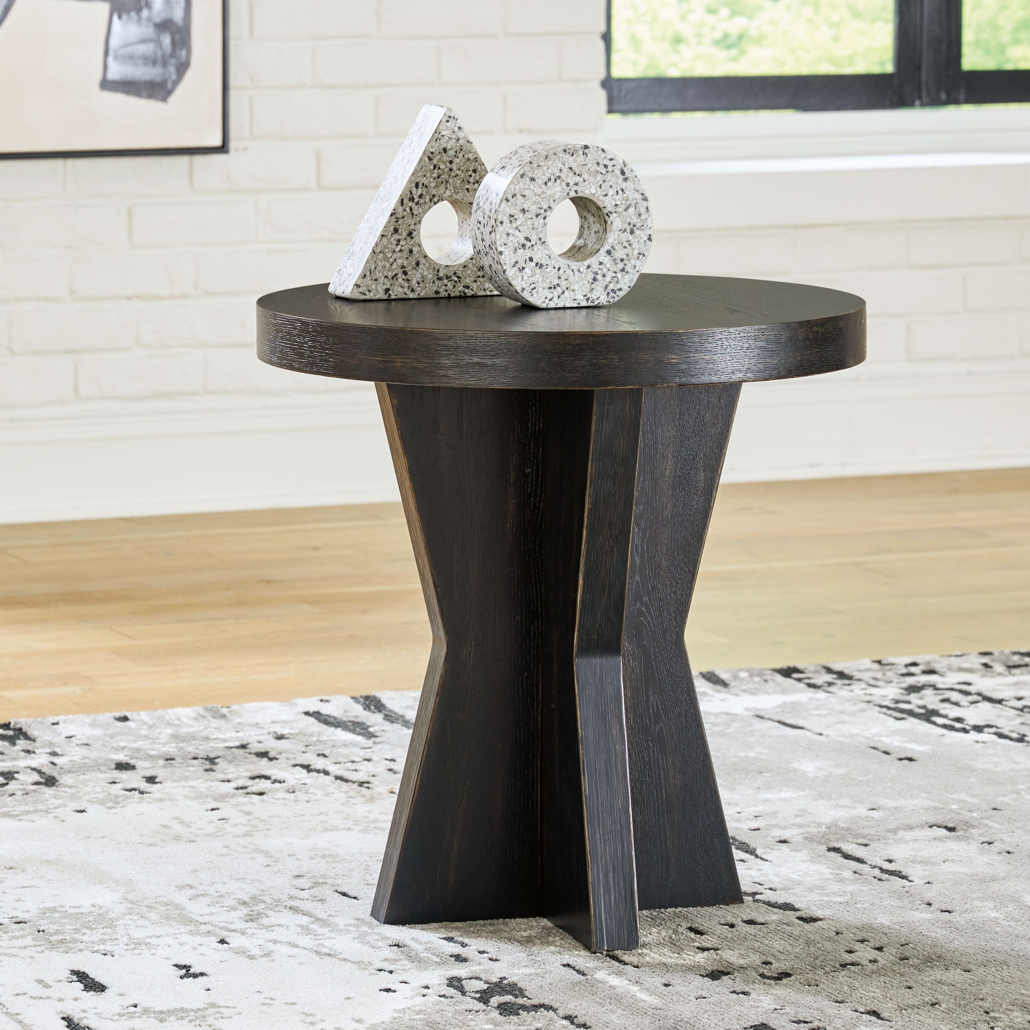 Signature Design by Ashley® Galliden - Black - Round End Table | Meri Furniture