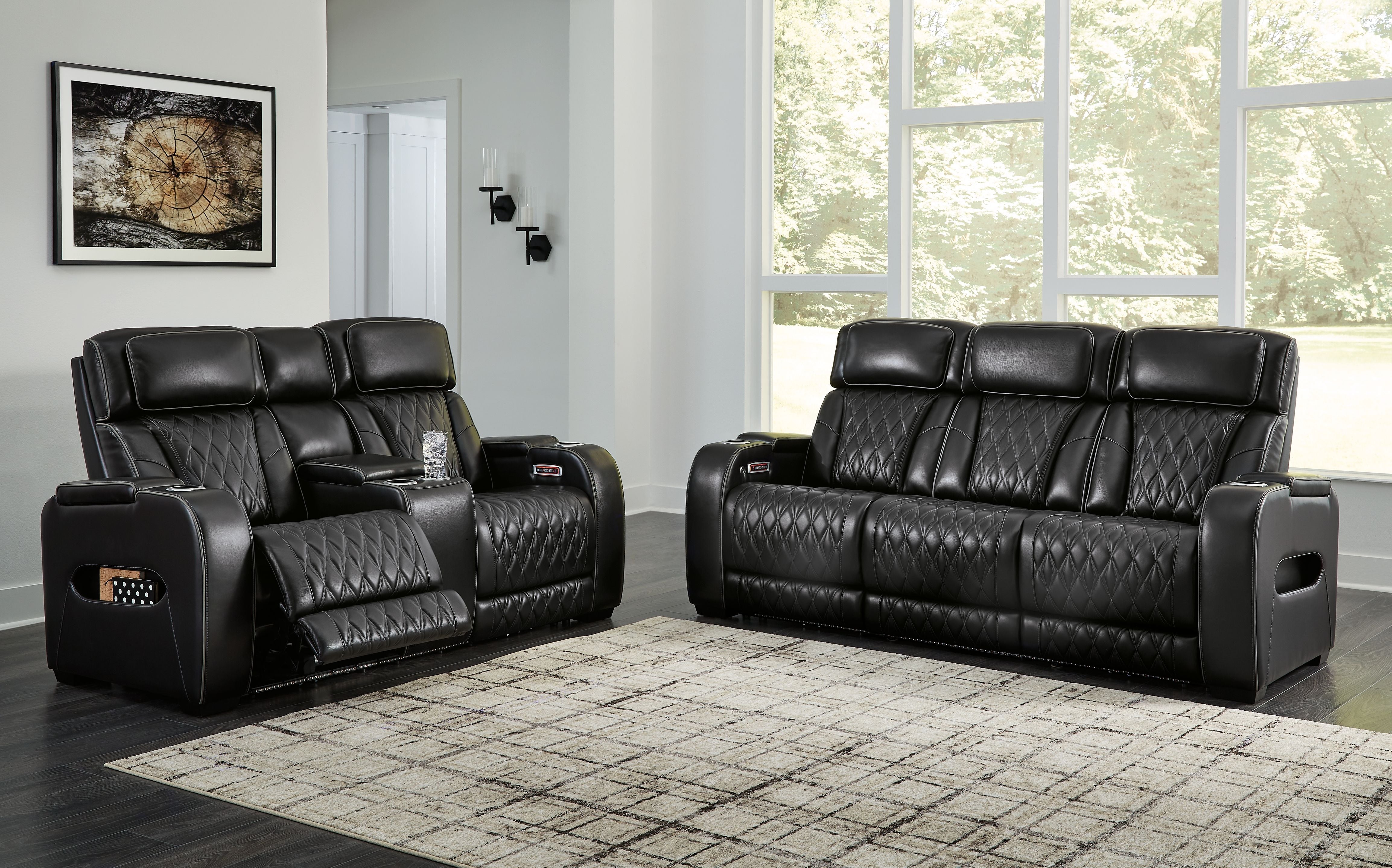 Signature Design by Ashley® Boyington - Black - 2 Pc. - Power Reclining Sofa And Loveseat | Meri Furniture