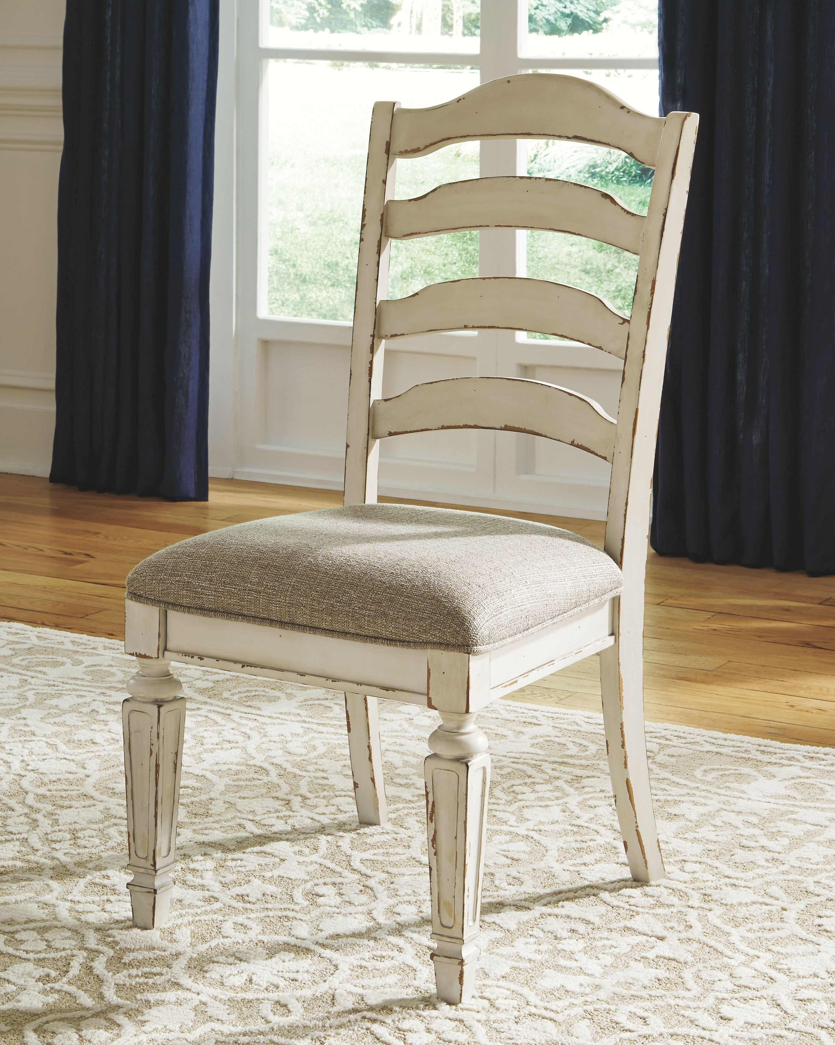 Signature Design by Ashley® Realyn - Oval Dining Table Set | Meri Furniture